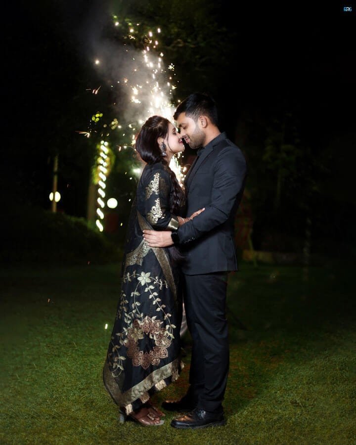 Evening pre-wedding shoot in a lit garden